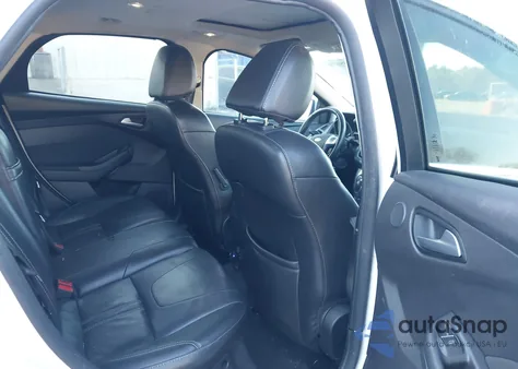 2012 Ford Focus Titanium z USA, uszkodzony, nr VIN 1FAHP3J20CL428059